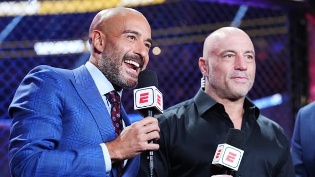 UFC play-by-play man Jon Anik on duty with Joe Rogan.